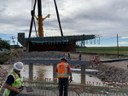 crews preparing to lower deck onto bridge superstructure.jpg thumbnail image