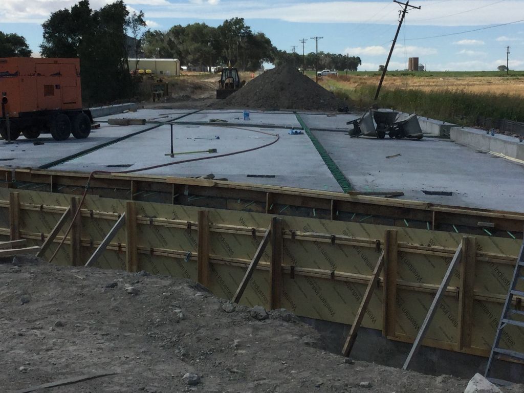 Deck placement and falsework bridge on CO 10