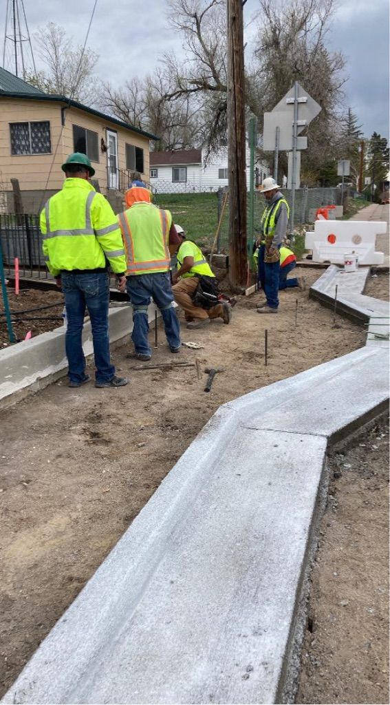 Crews installing new ramps and sections of sidewalk in Kiowa.jpg detail image