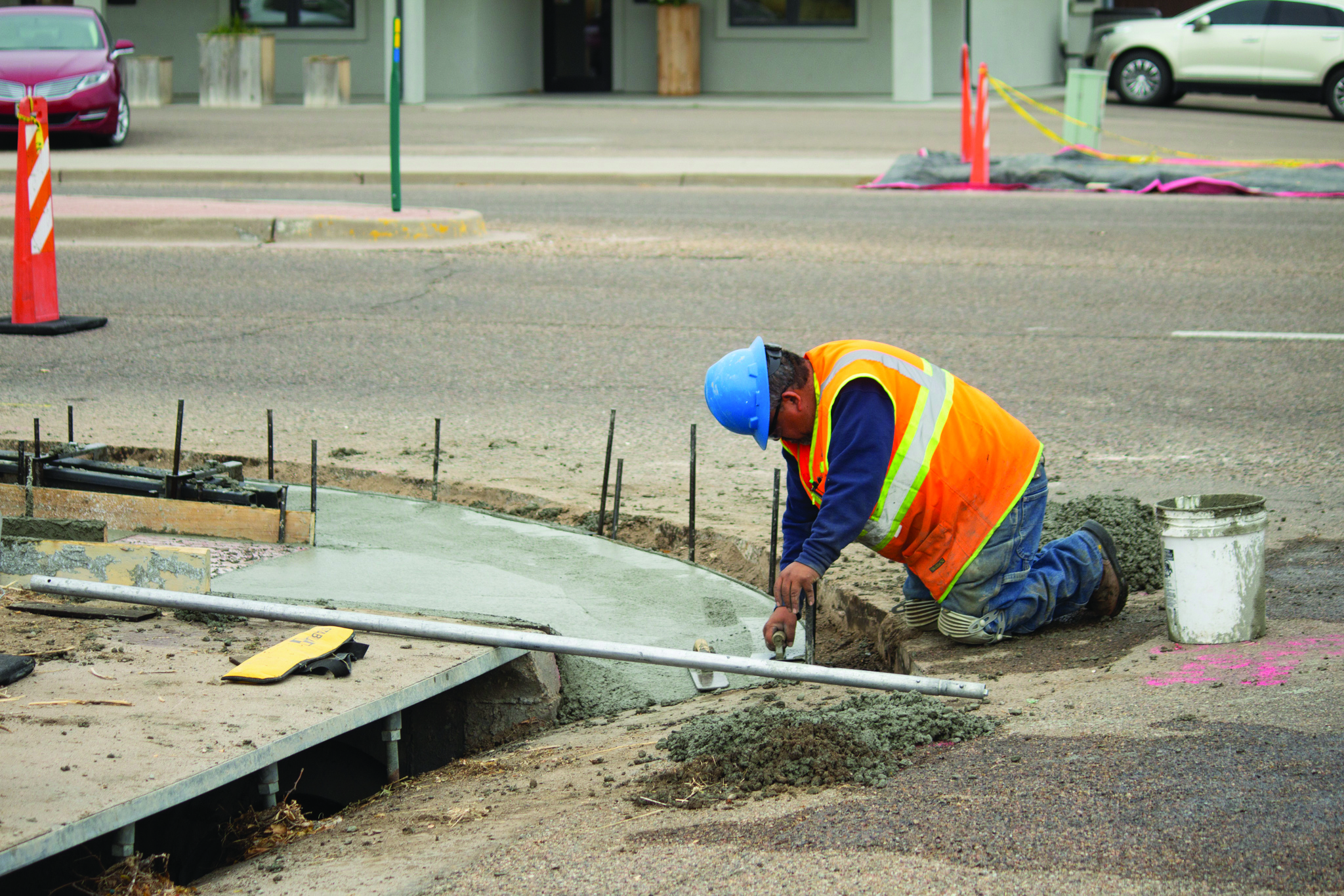 crews laying concrete on Rose Ave at 13th Burlington.jpg detail image