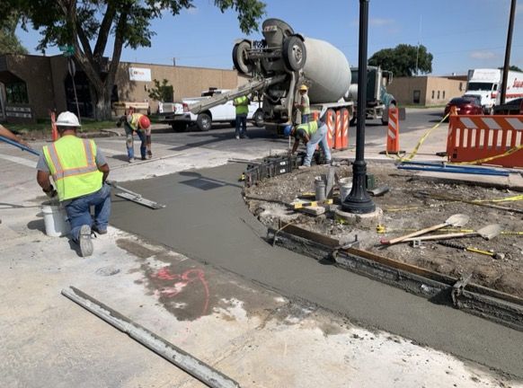 Crews paving and adding new curb ramps US 40 and 3rd Ave Hugo.jpg detail image