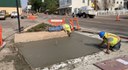 Crews smoothing concrete after pour CO 86 at SW corner of Main.jpg thumbnail image