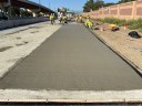 Crews finishing concrete paving of new auxiliary lane.jpg thumbnail image