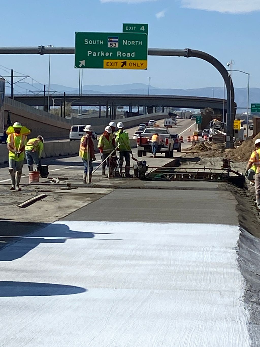 crews laying concrete auxiliary lane SB 225 at Parker Road.jpg detail image