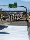 crews laying concrete auxiliary lane SB 225 at Parker Road.jpg thumbnail image