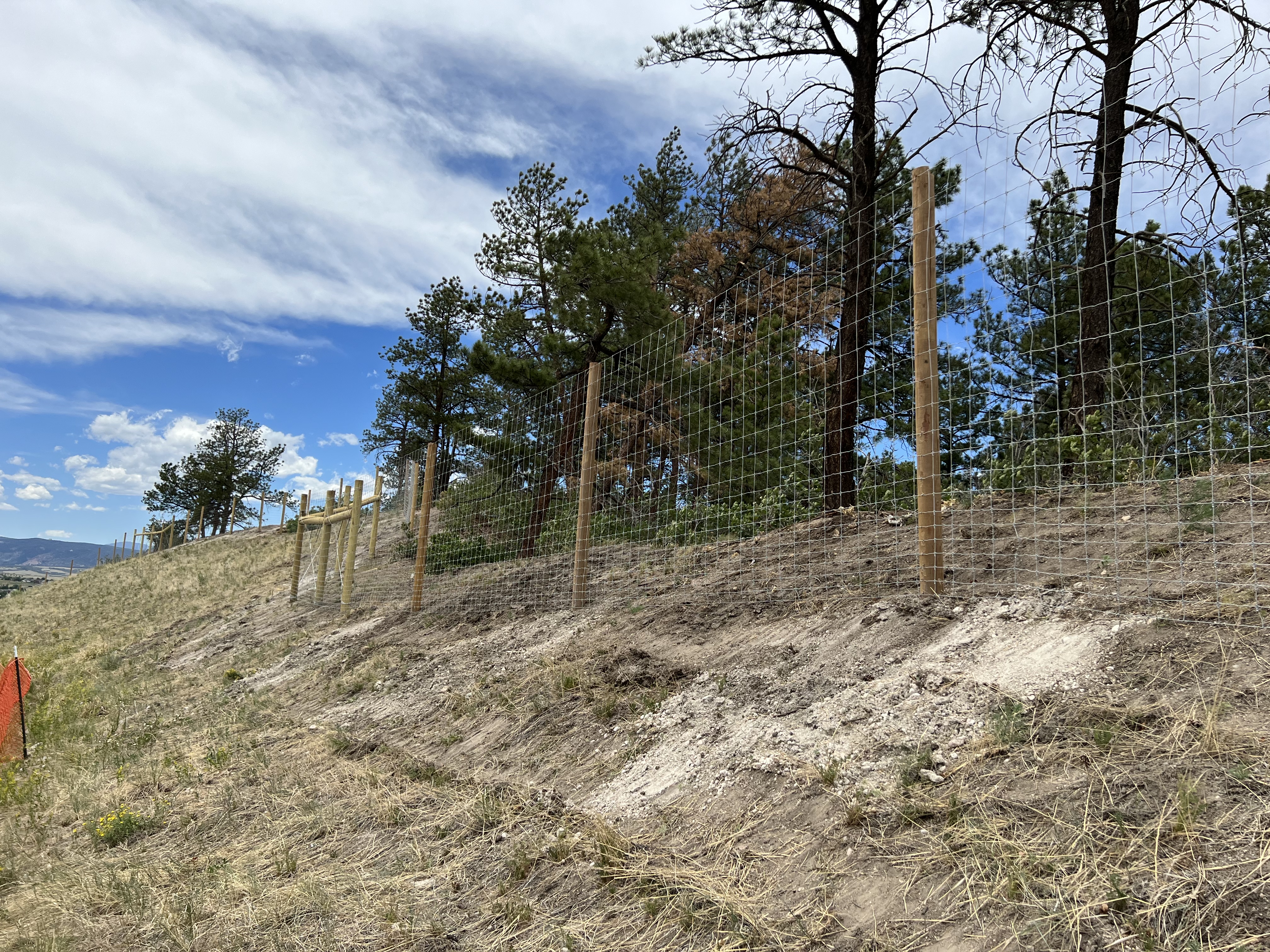 Wildlife fencing continues to go up along the west side of I-25 near Happy Canyon Road. detail image