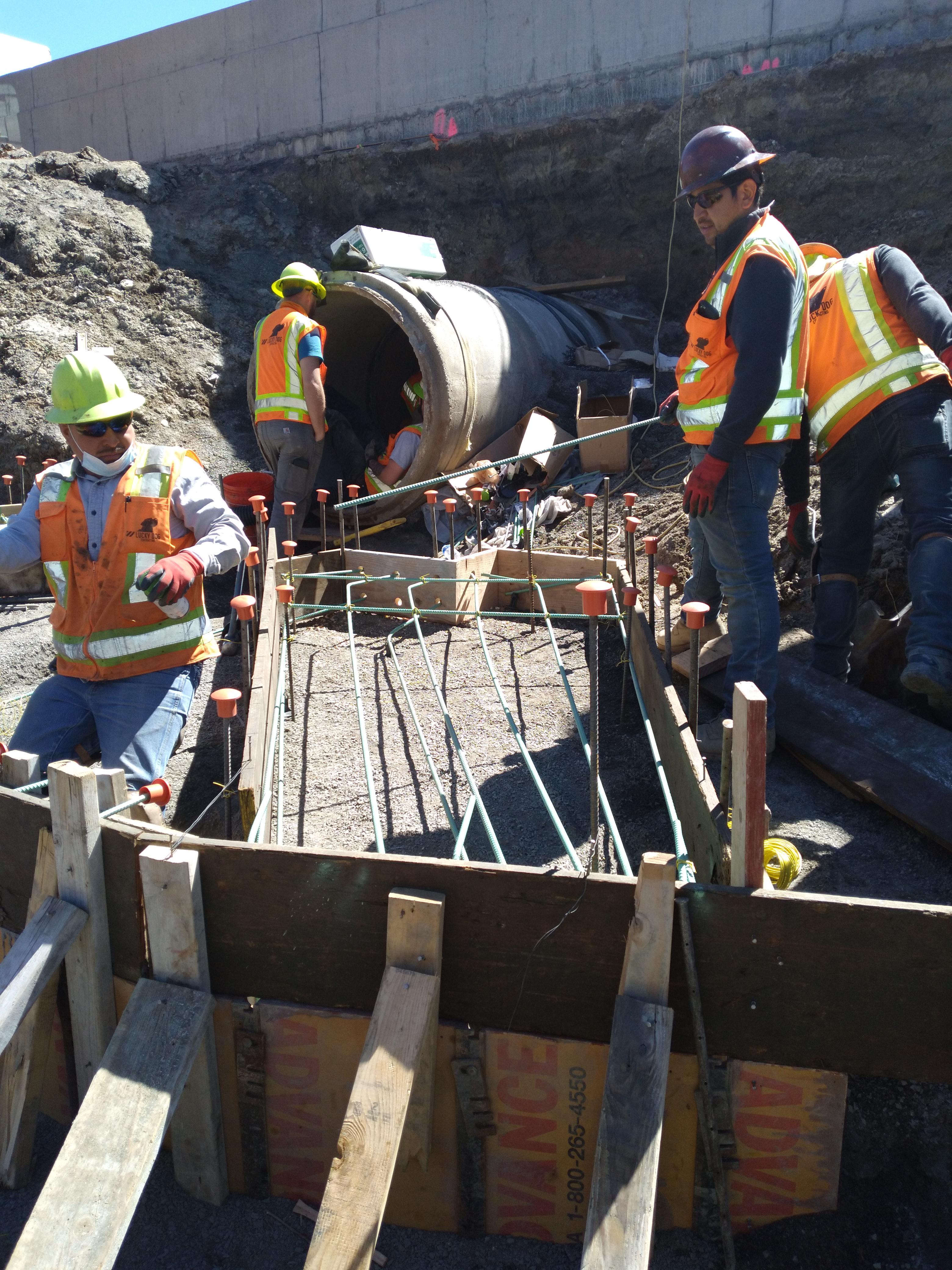 crews laying formwork and rebar for headwall.jpg detail image