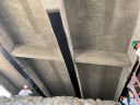 Closeup view of crews wrapping girders with fiber reinforced polymer.jpg thumbnail image