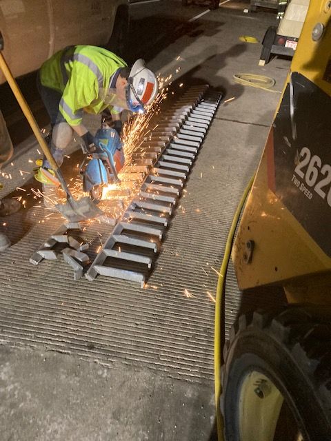 night crew repairing bridge joints.jpg detail image