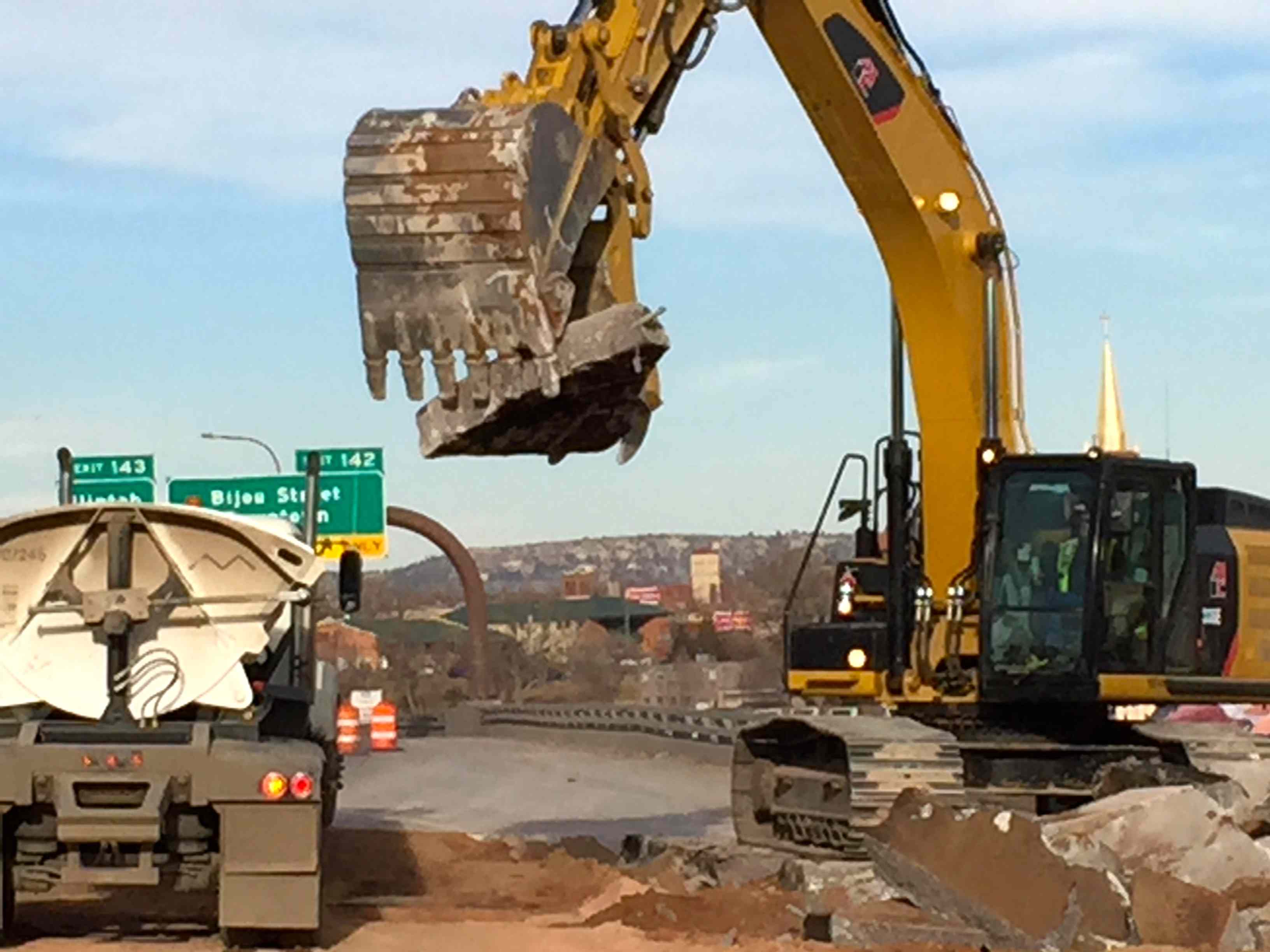 Crews removing concrete from northbound I-25 detail image