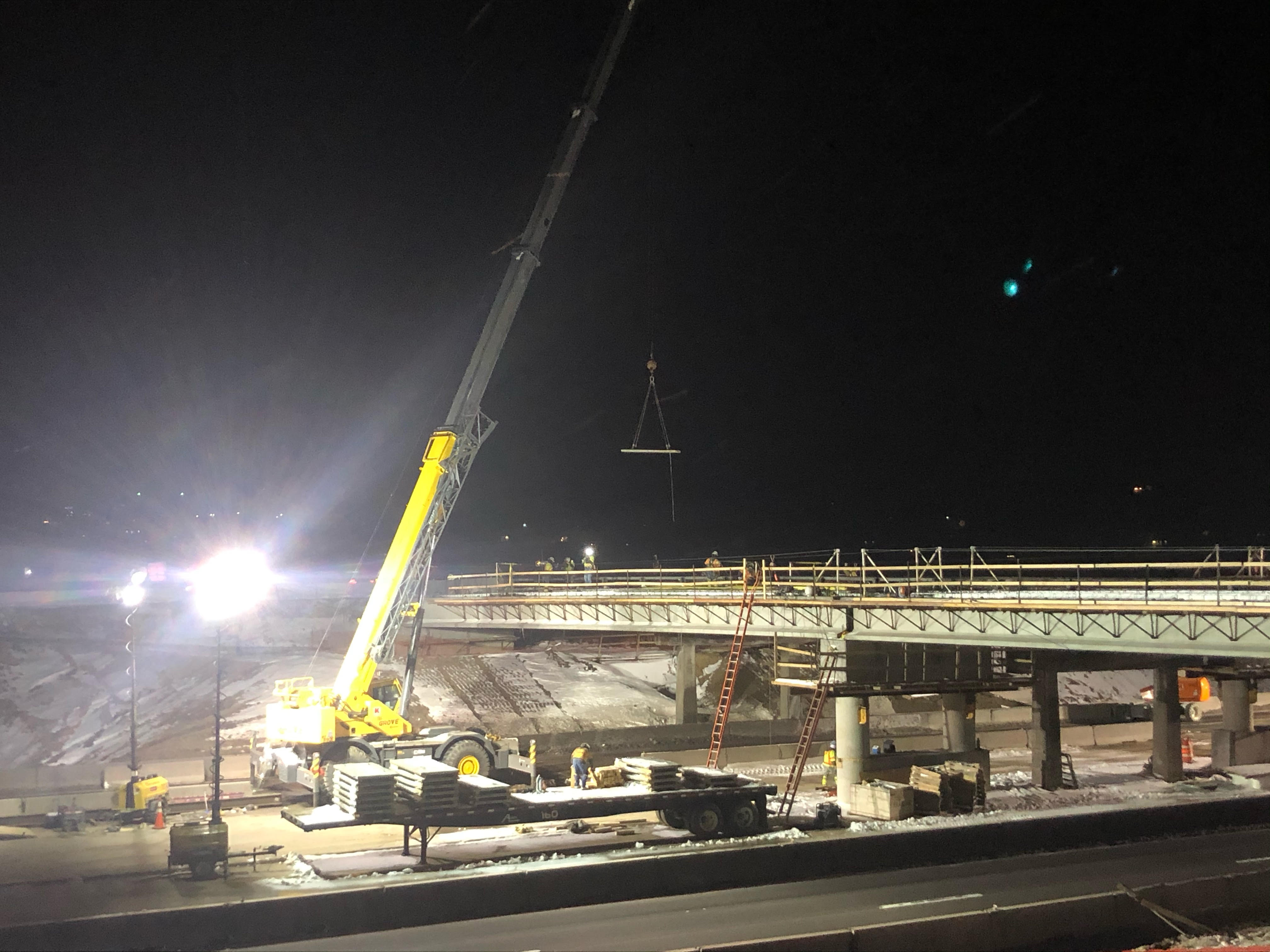 County Line Road bridge construction - photo of crane working on bridge.jpg detail image