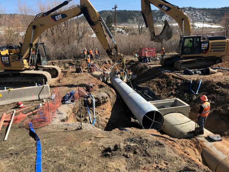 Drainage pipe installation on the frontage road
