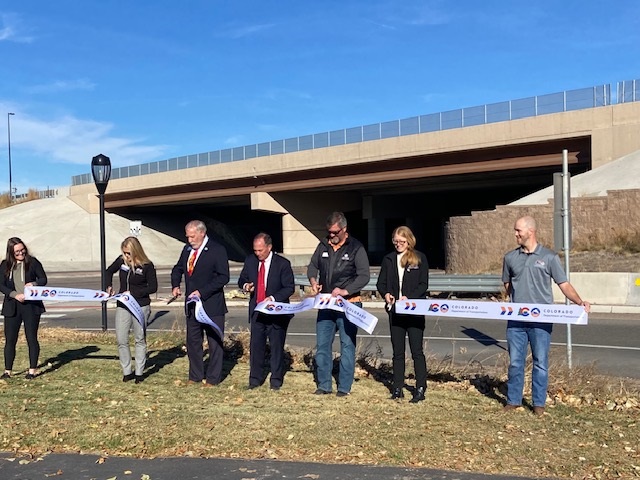 Team and state reps cutting ribbon at ceremony for I-70 over 32nd Ave Estate Media.jpg detail image
