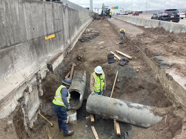 Crews repairing a cracked drain in the Eastbound I-70 Express Lane in May. detail image