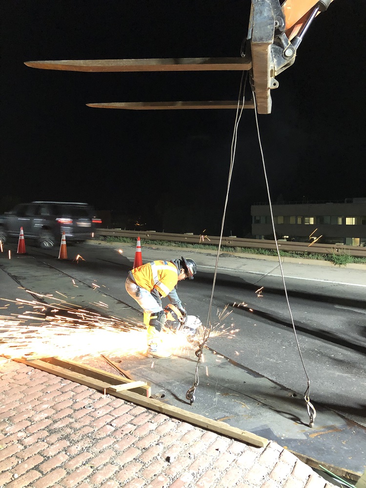 Crews replacing expansion joints CO 157 Photo Randy Smith.jpg detail image