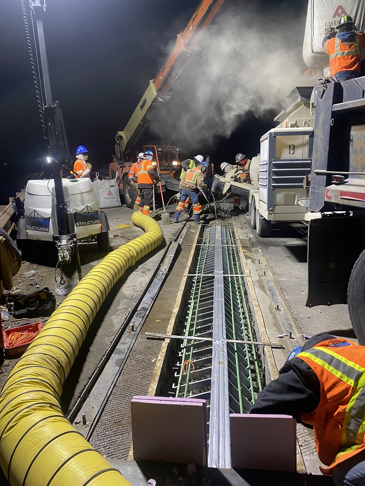 Night crews repairing and pouring expansion joints at CO 157 bridge photo Chris Kelly.JPG detail image