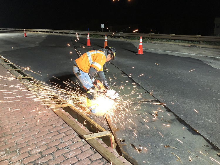 Night crews replacing expansion joints on CO 157 bridge photo Randy Smith.jpg detail image
