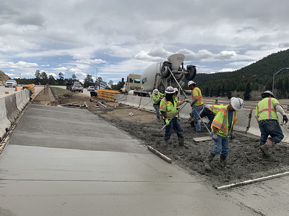 Pouring smoothing concrete.jpg