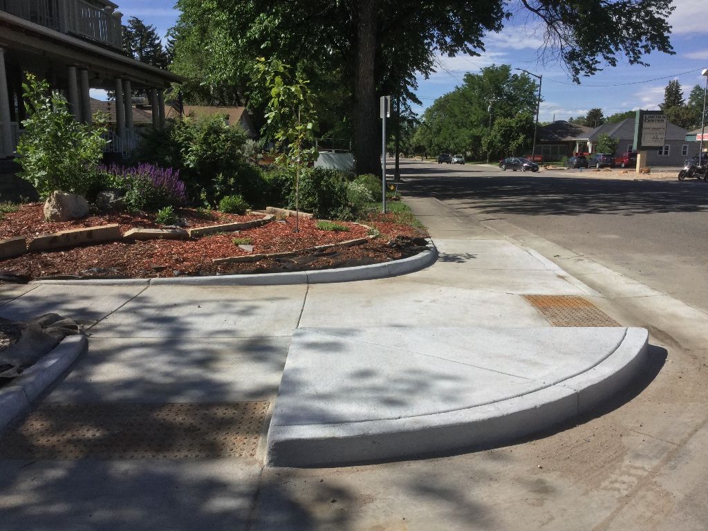 new ramps and refurbed sidewalk Lincoln Loveland.JPG detail image