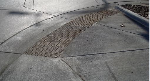 8th ave and 5th finished curb ramp to prowag standards.jpg