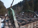 Crews demolish one of the US 34 bridges over the Big Thompson Canyon. thumbnail image