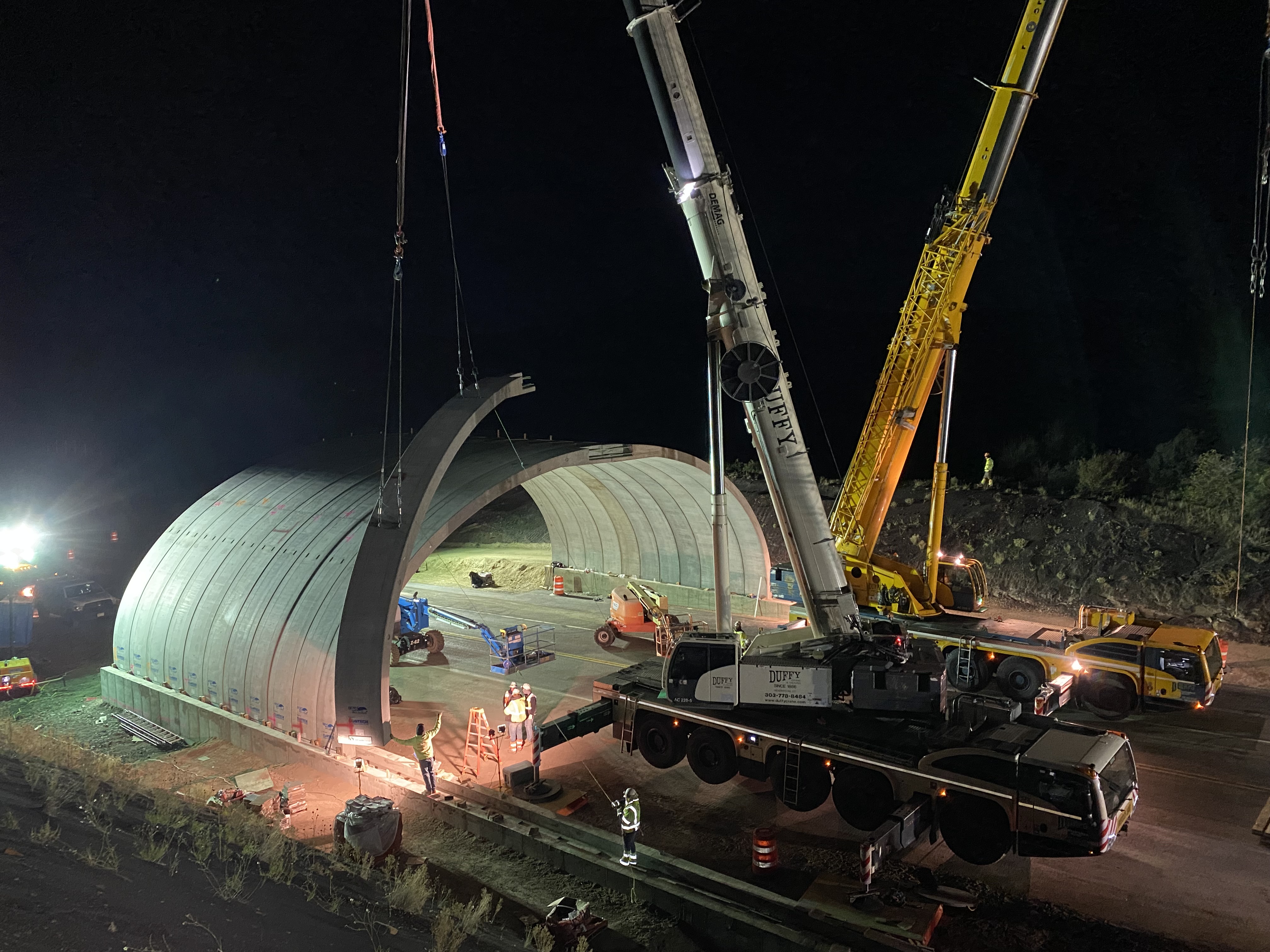 Placing concrete forms at US 160 Wildlife Project at night detail image