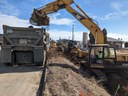 Crews excavating behind barrier for widening 2 10 23.jpg thumbnail image