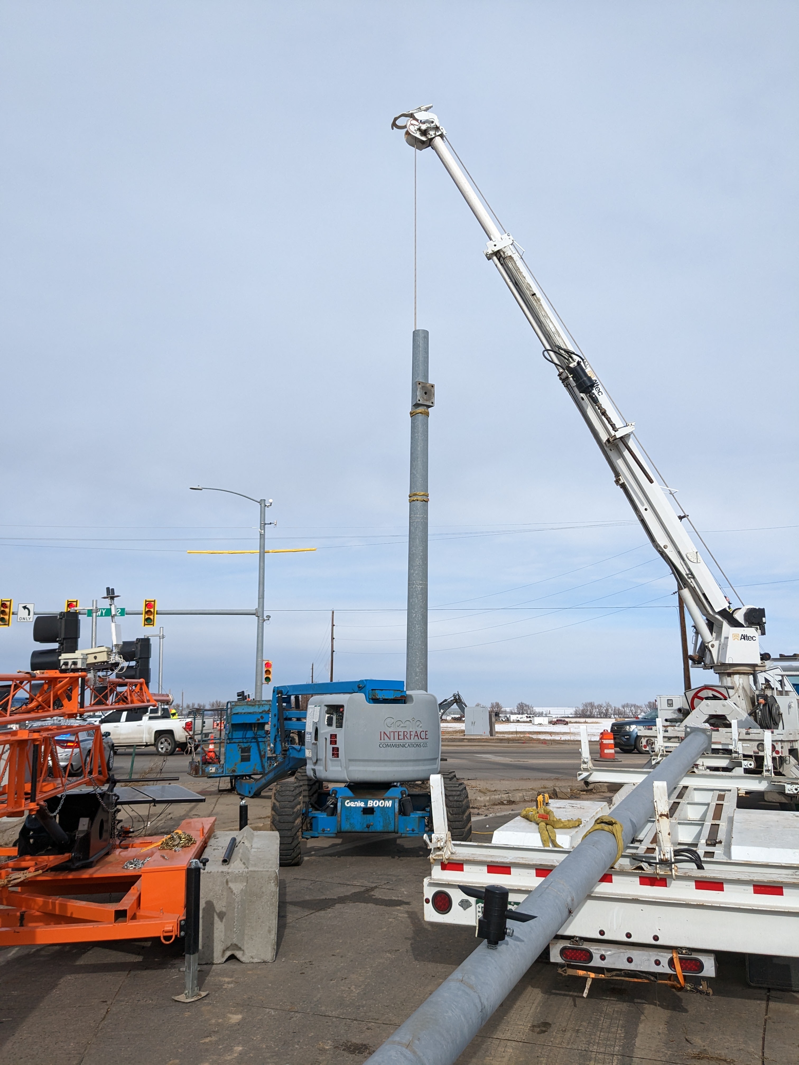 Crews moving signal poles at intersection photo tim bricker.jpg detail image