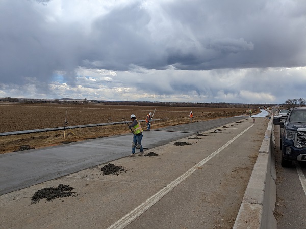 Paving widened section at the intersection of US 287 and CO 52 Photo Tim Bricker.jpg detail image