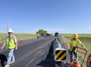 Crews paving top mat on US 385 with flaggers photo Felipe Lopez.jpg thumbnail image