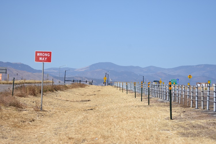 Finished section of cable rail with signs and seeding.jpg detail image