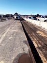 Crews work on road while traffic is on other side thumbnail image