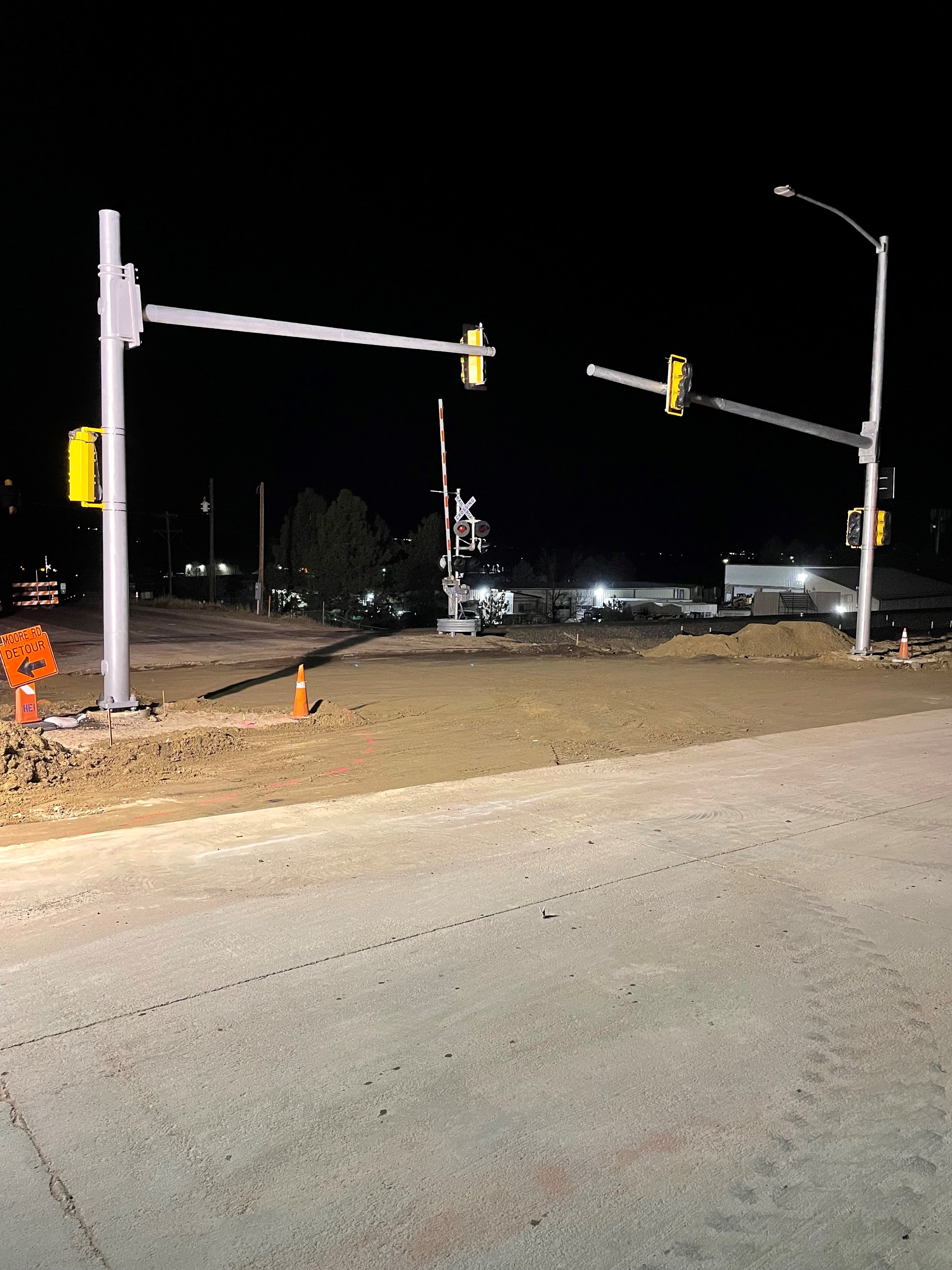 Night asphalt paving activities at Airport Road to reduce traffic impacts. May 6, 2022. detail image