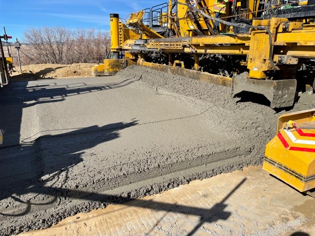 Crews work to lay the new concrete. March 2022 detail image