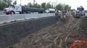 The first level of the soil nail wall being constructed on the west side of Wadsworth.  Allows crews to build as much of the first section of box as possible with traffic very close. thumbnail image