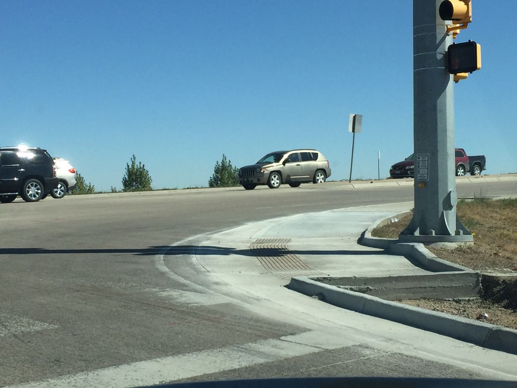Upgraded curb ramp at intersection of CO 392 and I-25 northbound.JPG detail image