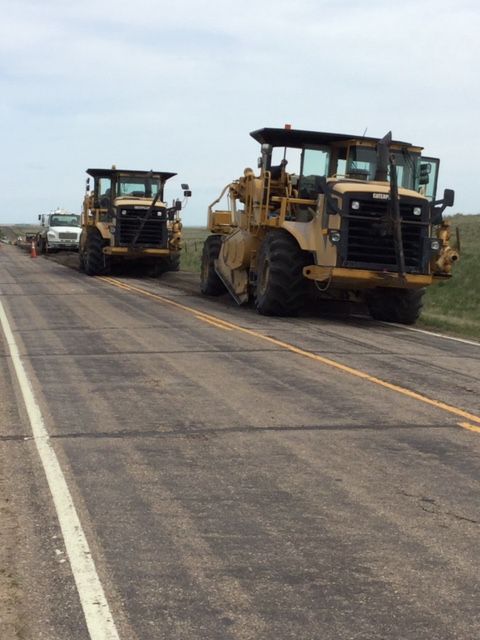 Trucks lay new asphalt on CO 52 detail image