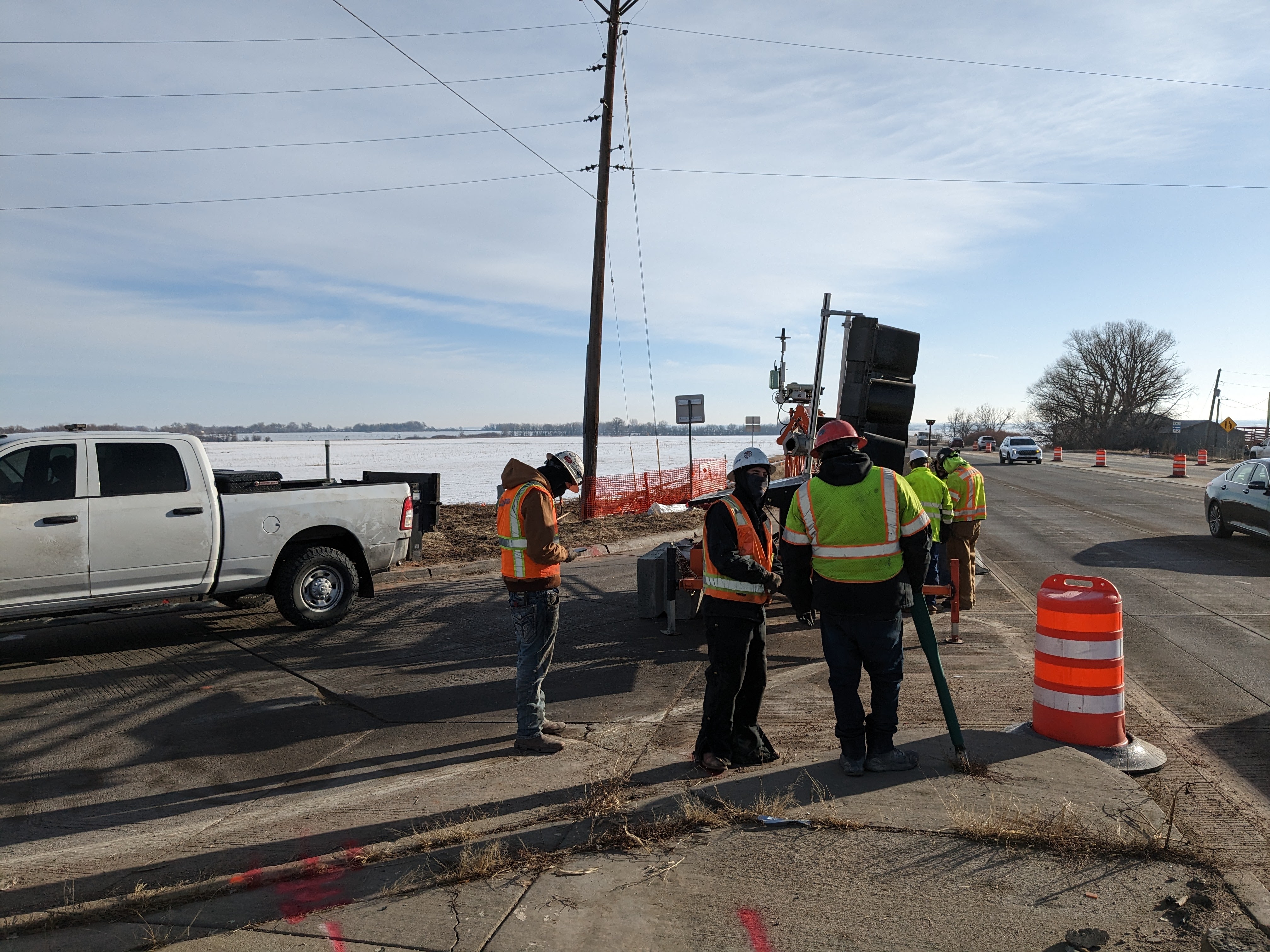 crews placing temp signals photo tim bricker.jpg detail image