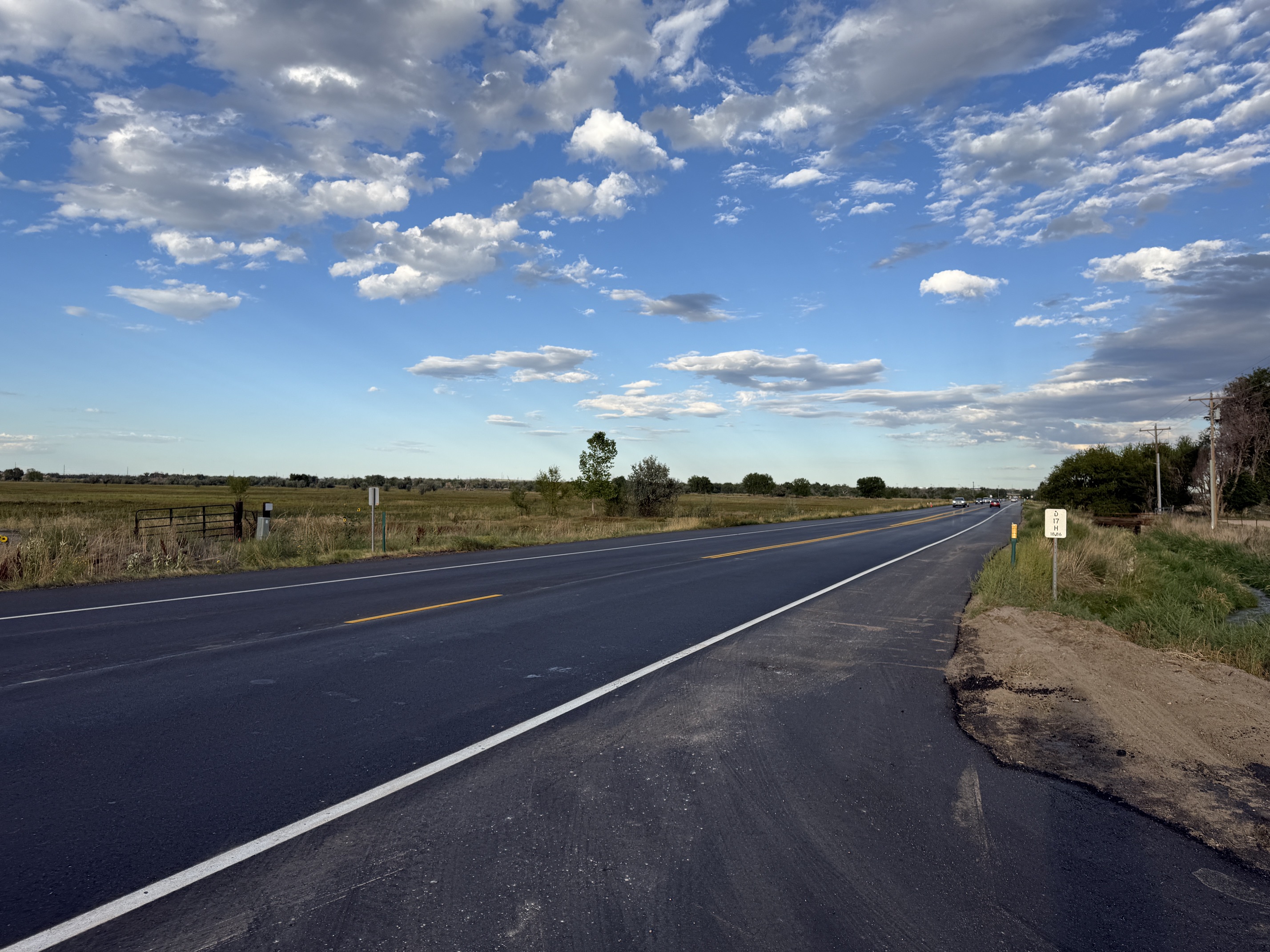 CO 52 Resurfacing Between I-25 and US 85 New asphalt pavment on CO 52 west of Fort Lupton.JPG detail image