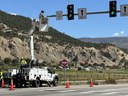 Crews work to install new signal heads on eastbound CO 82 at Catherine Store Road. thumbnail image