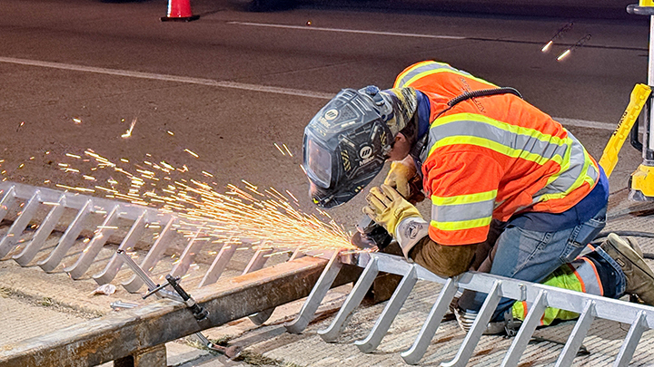 Bridge Repairs in Denver and Adams County - Customizing bridge joint on I-225.jpg detail image