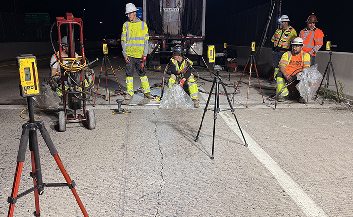 Bridge Repairs in Denver and Adams County I-25 and I-70 Construction workers injecting bridge jacking substance.jpg detail image