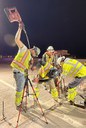 Bridge Repairs in Denver and Adams County I-25 and I-70 men drilling holes for injection rods.jpg thumbnail image