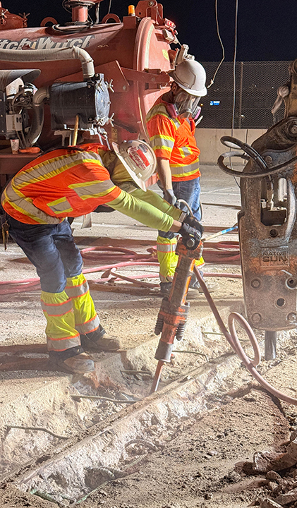 Bridge Repairs in Denver and Adams County - Native Sun jackhammering out old concrete from damaged bridge joint on I-225.jpg detail image
