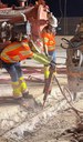 Bridge Repairs in Denver and Adams County - Native Sun jackhammering out old concrete from damaged bridge joint on I-225.jpg thumbnail image
