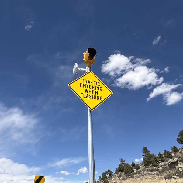 A traffic sign and beacon which was installed as part of the Conflict Warning Installation project.