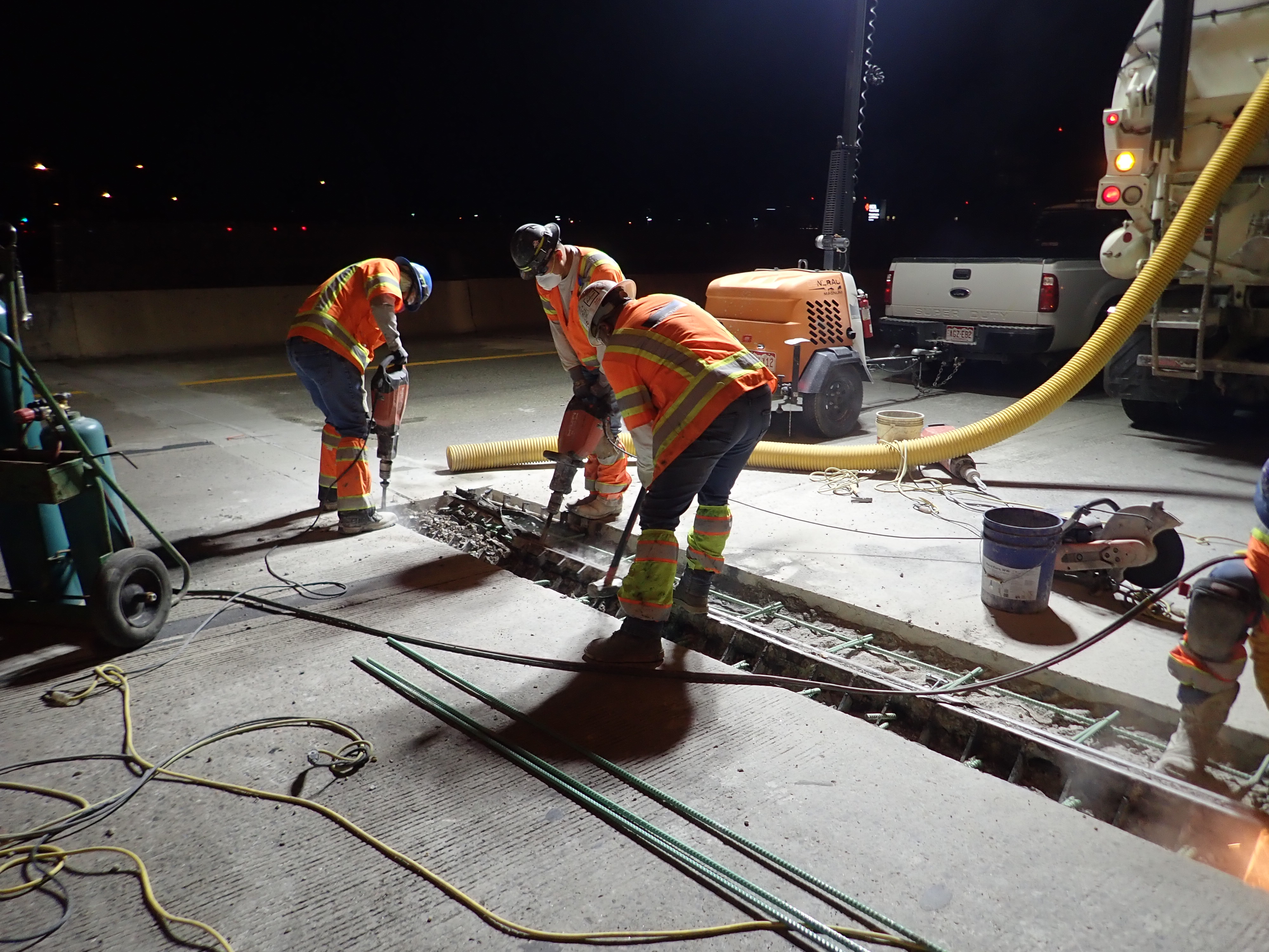 I-225 Bridge Rehabilitation Removal of 6th Ave. bridge northbound middle lane joint header armor September 2025.jpg detail image