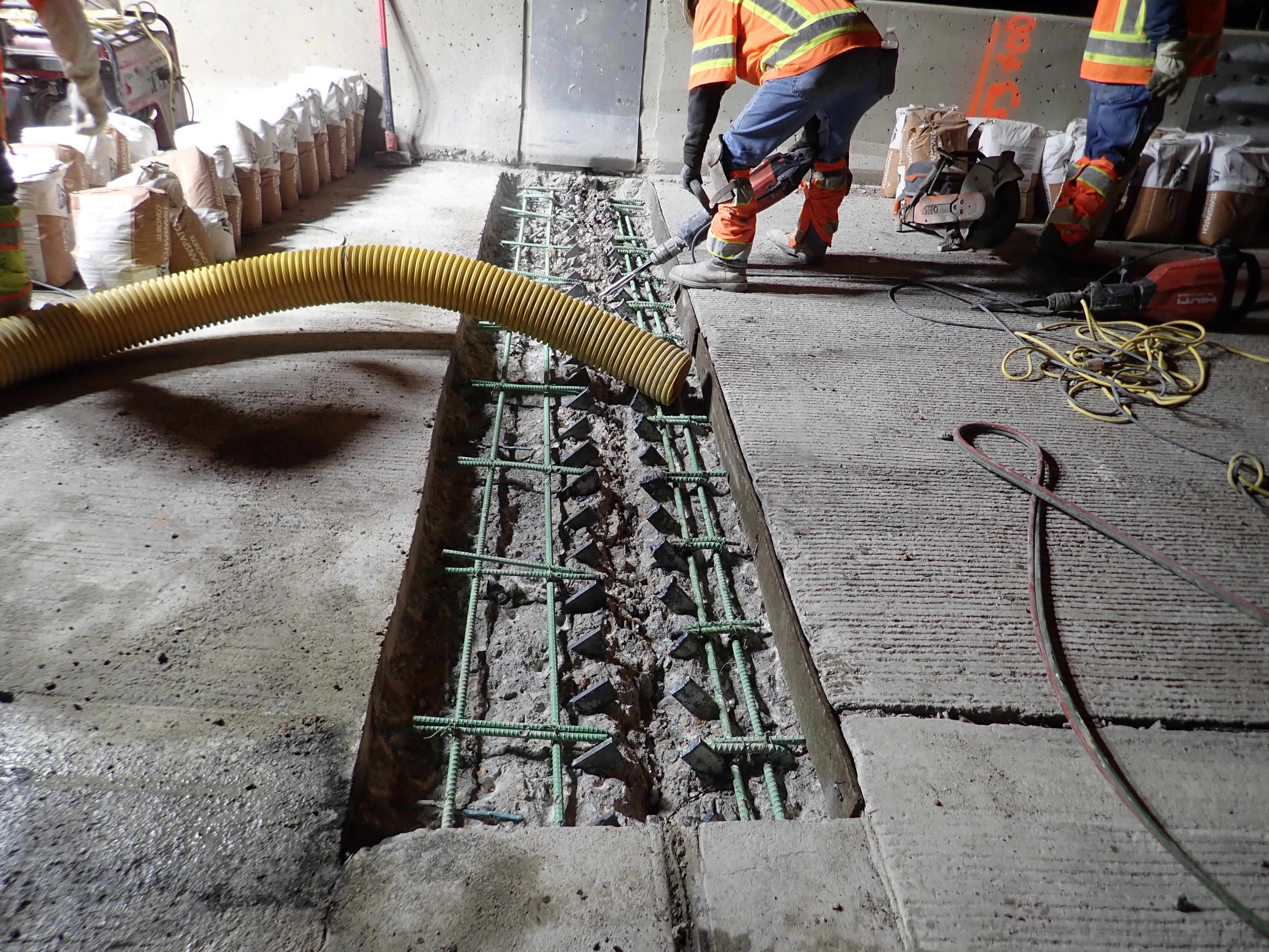 I-225 Bridge Rehabilitation Removal of 6th Avenue bridge northbound right shoulder armor joint header September 2025.jpg detail image