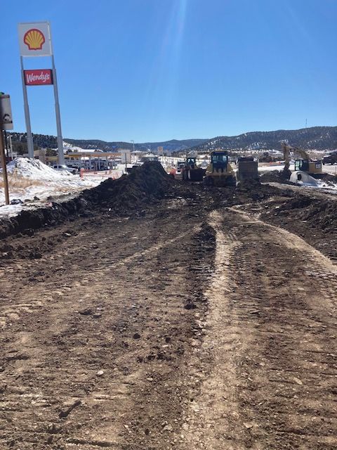 Crews lowering and grading Santa Fe Trail.jpg detail image