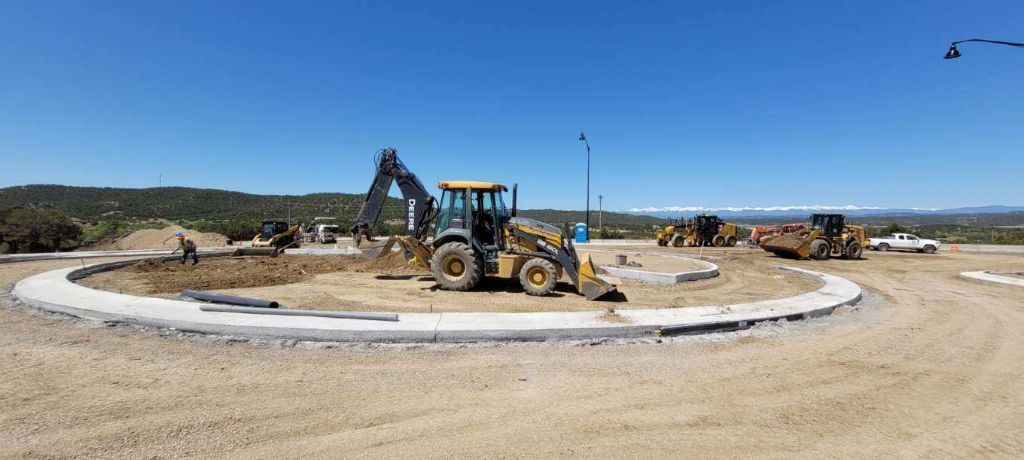crews working on the west roundabout at Exit 11.jpg detail image